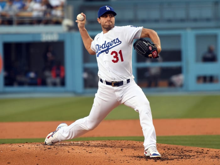 Aug 4, 2021; Los Angeles, California, USA; Los Angeles Dodgers starting pitcher Max Scherzer (31) throws against the Houston Astros during the second inning at Dodger Stadium.